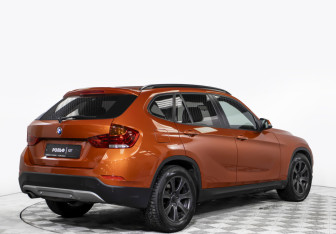 Подержанный автомобиль BMW X1 2014 года (5 фото)