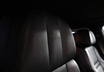 Подержанный автомобиль BMW X6 M 2013 года (26 фото)