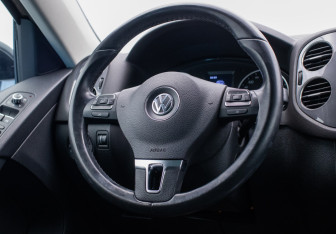 Подержанный автомобиль Volkswagen Tiguan 2014 года (15 фото)