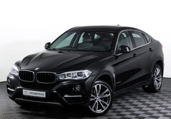 Подержанный автомобиль BMW X6 2016 года (21 фото)