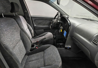 Подержанный автомобиль Kia Spectra Sedan 2007 года (9 фото)