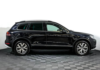 Подержанный автомобиль Volkswagen Touareg 2014 года (4 фото)