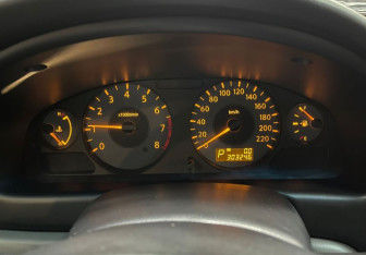 Подержанный автомобиль Nissan Almera Classic 2010 года (13 фото)