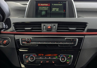 Подержанный автомобиль BMW X1 2017 года (15 фото)