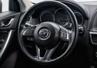 Подержанный автомобиль Mazda CX-5 2015 года (15 фото)