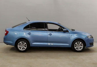 Подержанный автомобиль Skoda Rapid Liftback 2014 года (4 фото)
