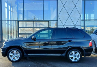 Подержанный автомобиль BMW X5 2005 года (8 фото)