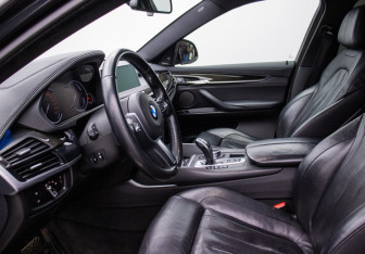Подержанный автомобиль BMW X6 2014 года (10 фото)