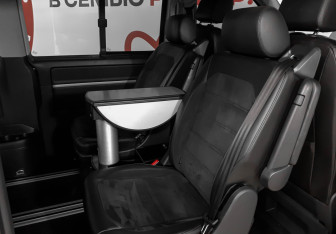Подержанный автомобиль Volkswagen Multivan 2016 года (13 фото)