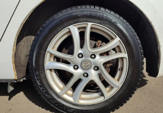 Подержанный автомобиль Mazda 3 Sedan 2011 года (13 фото)