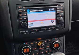 Подержанный автомобиль Nissan Qashqai+2 2011 года (14 фото)