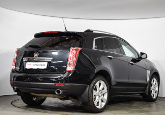 Подержанный автомобиль Cadillac SRX 2014 года (2 фото)