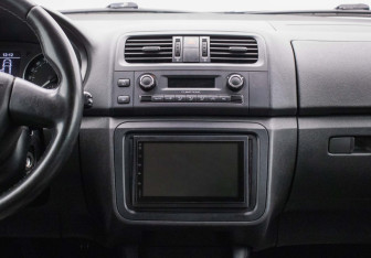 Подержанный автомобиль Skoda Fabia Hatchback 2010 года (14 фото)