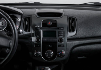 Подержанный автомобиль Kia Cerato Sedan 2011 года (13 фото)