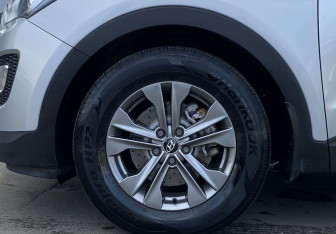 Подержанный автомобиль Hyundai Santa Fe 2014 года (9 фото)