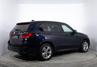 Подержанный автомобиль BMW X5 2014 года (5 фото)