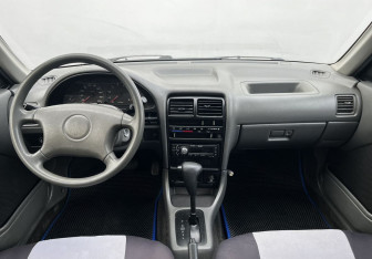 Подержанный автомобиль Suzuki Swift Sedan 2002 года (12 фото)