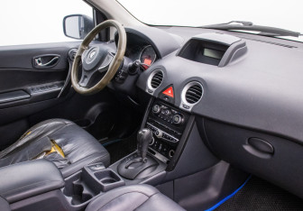 Подержанный автомобиль Renault Koleos 2009 года (10 фото)
