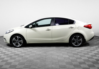 Подержанный автомобиль Kia Cerato Sedan 2013 года (3 фото)