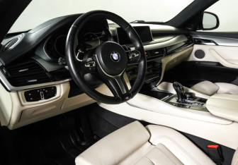 Подержанный автомобиль BMW X6 2016 года (15 фото)