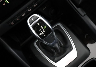 Подержанный автомобиль BMW X1 2013 года (19 фото)