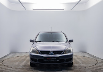 Подержанный автомобиль Mitsubishi Lancer Sedan 2009 года (2 фото)