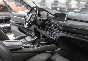 Подержанный автомобиль BMW X6 2015 года (11 фото)