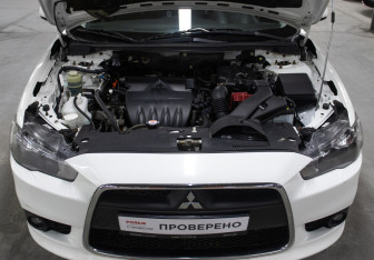 Подержанный автомобиль Mitsubishi Lancer Sedan 2014 года (9 фото)
