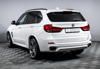 Подержанный автомобиль BMW X5 2015 года (7 фото)