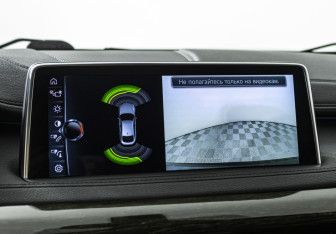 Подержанный автомобиль BMW X6 2017 года (16 фото)