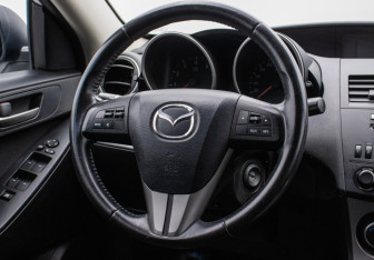 Подержанный автомобиль Mazda 3 Hatchback 2009 года (15 фото)