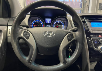 Подержанный автомобиль Hyundai i30 Hatchback 2013 года (14 фото)