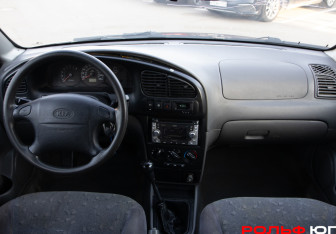 Подержанный автомобиль Kia Spectra Sedan 2006 года (11 фото)