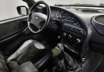 Подержанный автомобиль Chevrolet Niva 2005 года (10 фото)