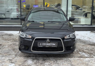 Подержанный автомобиль Mitsubishi Lancer Sedan 2012 года (2 фото)