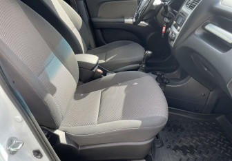 Подержанный автомобиль Kia Sportage 2010 года (9 фото)