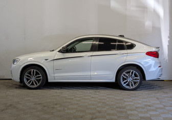 Подержанный автомобиль BMW X4 2015 года (8 фото)