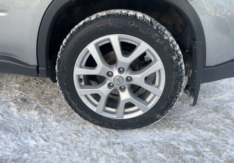 Подержанный автомобиль Nissan X-Trail 2013 года (12 фото)