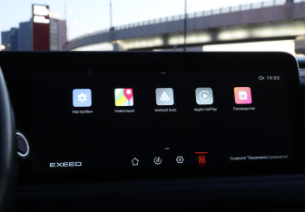 Подержанный автомобиль Exeed TXL 2022 года (13 фото)