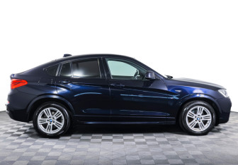 Подержанный автомобиль BMW X4 2016 года (4 фото)