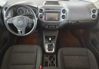 Подержанный автомобиль Volkswagen Tiguan 2014 года (9 фото)
