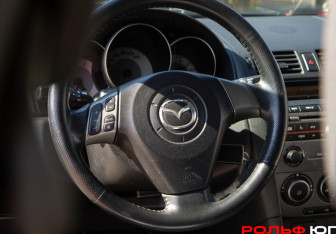 Подержанный автомобиль Mazda 3 Hatchback 2006 года (10 фото)