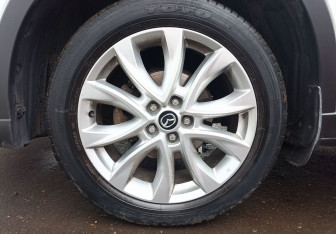 Подержанный автомобиль Mazda CX-5 2014 года (9 фото)