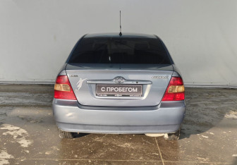 Подержанный автомобиль Toyota Corolla Sedan 2003 года (5 фото)