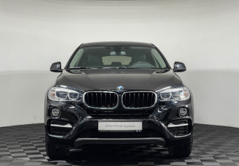 Подержанный автомобиль BMW X6 2016 года (3 фото)