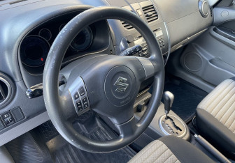 Подержанный автомобиль Suzuki SX4 Hatchback 2012 года (13 фото)