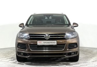 Подержанный автомобиль Volkswagen Touareg 2014 года (2 фото)