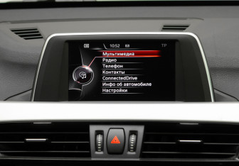 Подержанный автомобиль BMW X1 2015 года (25 фото)