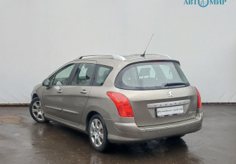Подержанный автомобиль Peugeot 308 Wagon 2010 года (7 фото)