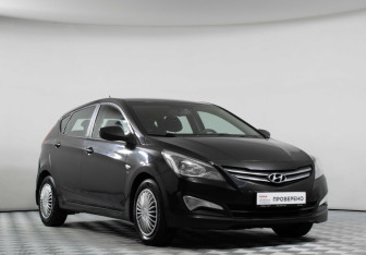 Подержанный автомобиль Hyundai Solaris Hatchback 2014 года (3 фото)